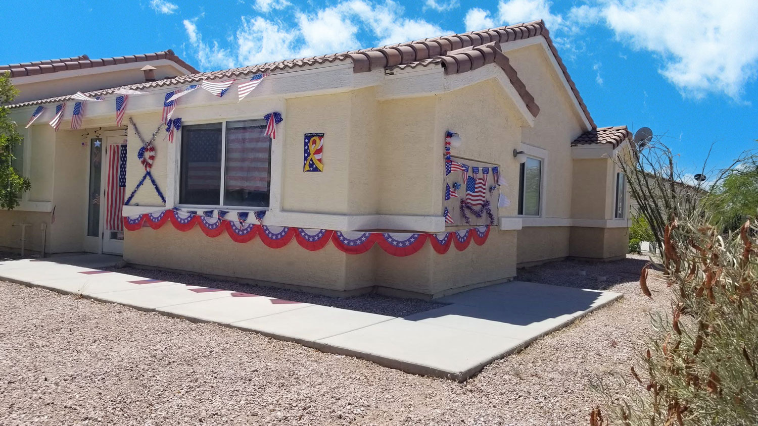 This image displays entrance marker photo of Quartzsite Senior Apartments