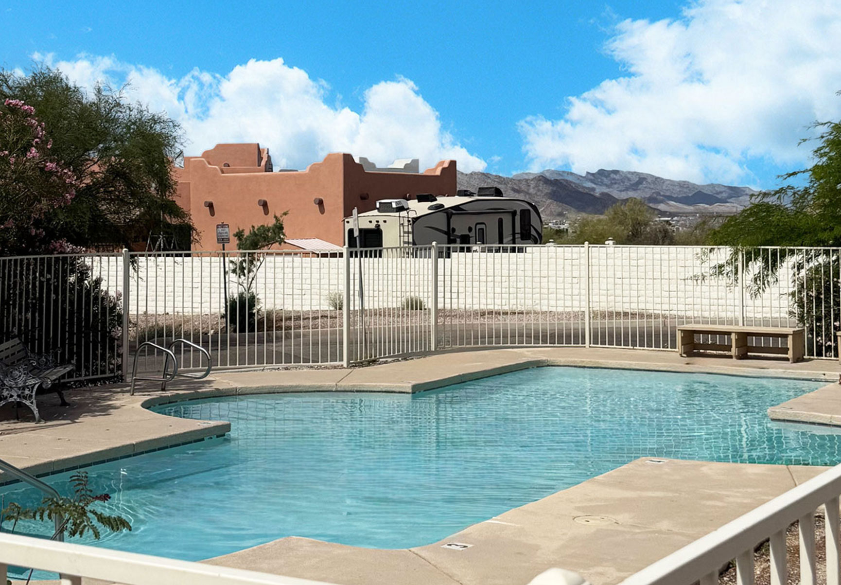 This image displays swimming pool photo of Quartzsite Senior Apartments